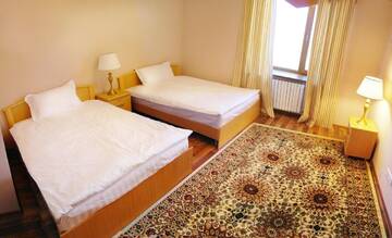 Фото номера Двухместный номер с 2 отдельными кроватями Отель Tumar Hotel г. Актобе 2